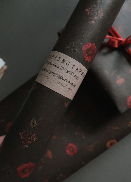 Florals on dark green kraft wrapping paper
