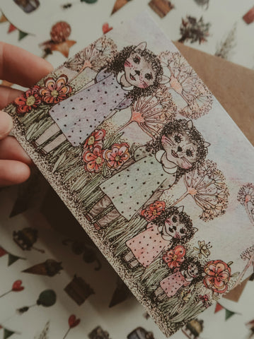 Four cat girls, folded card
