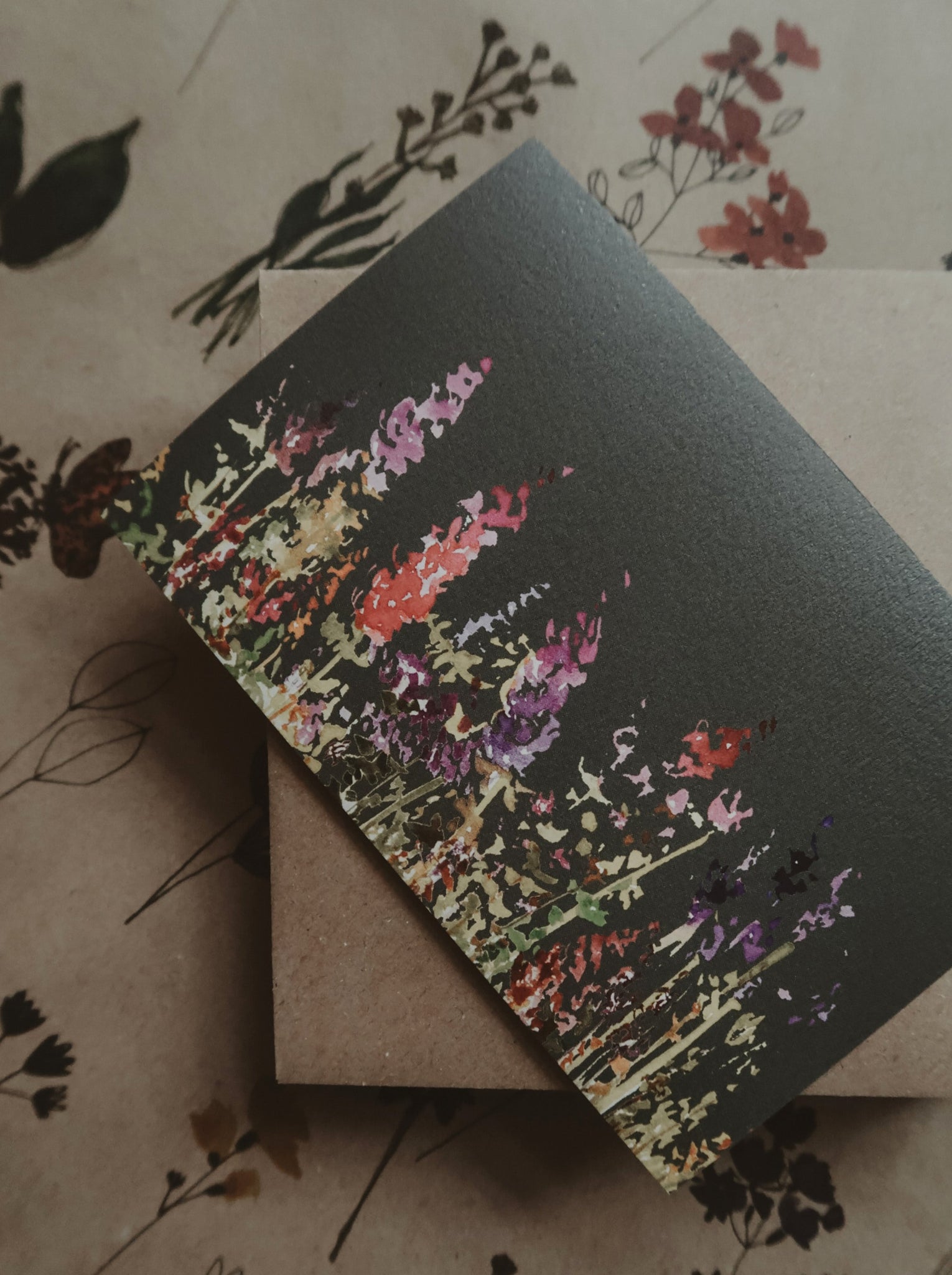Summer meadow on dark grey, postcard