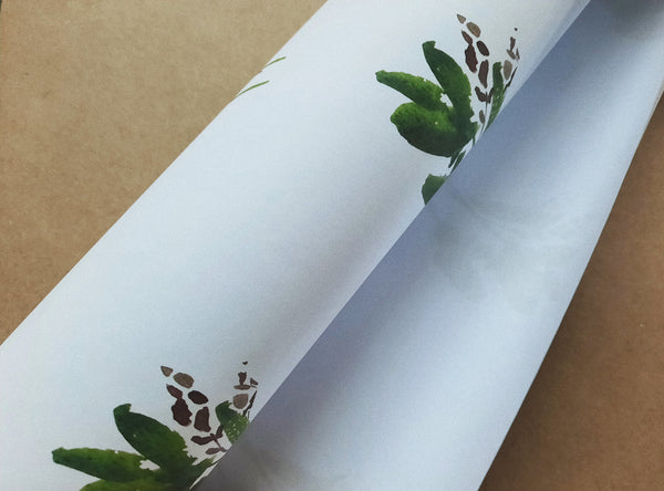 Green leaves white wrapping paper